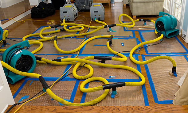 Professional Flood Damage Restoration technician working in Liberty, NC